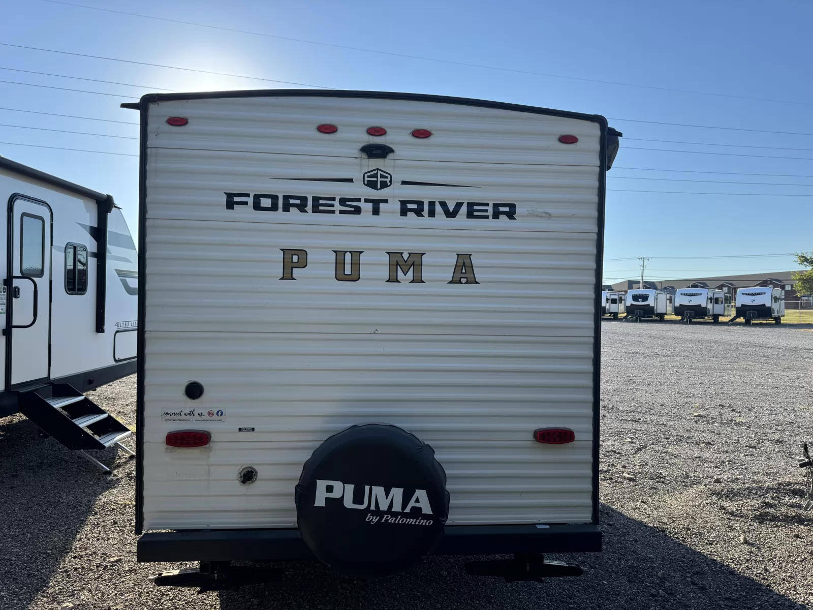 2025 Palomino Puma 16BHC travel trailer rear exterior available at Bell Camper Sales in Bartlesville, Oklahoma
