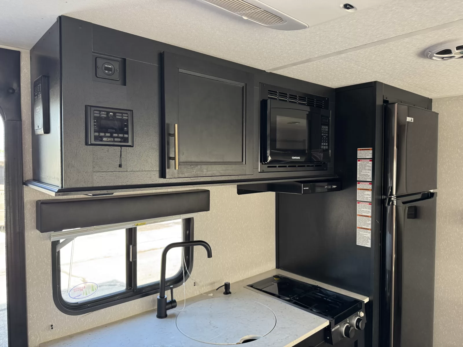 2022 Forest River Cherokee wolf pup 18to travel trailer kitchen and dining area available at Bell Camper Sales in Bartlesville, Oklahoma