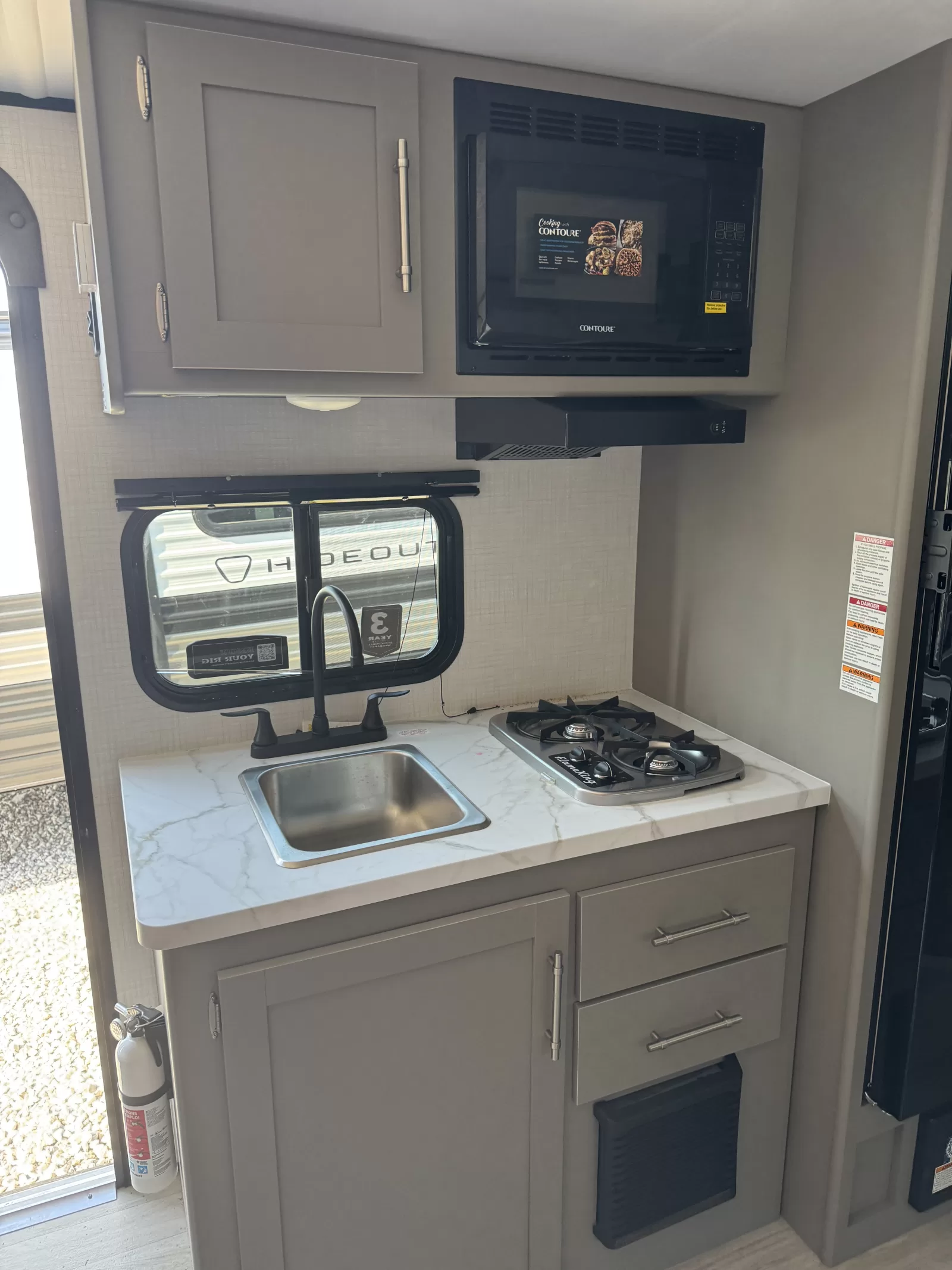 2027 Keystone Hideout Mini 199BHS kitchen dining area available at Bell Camper Sales in Bartlesville, Oklahoma