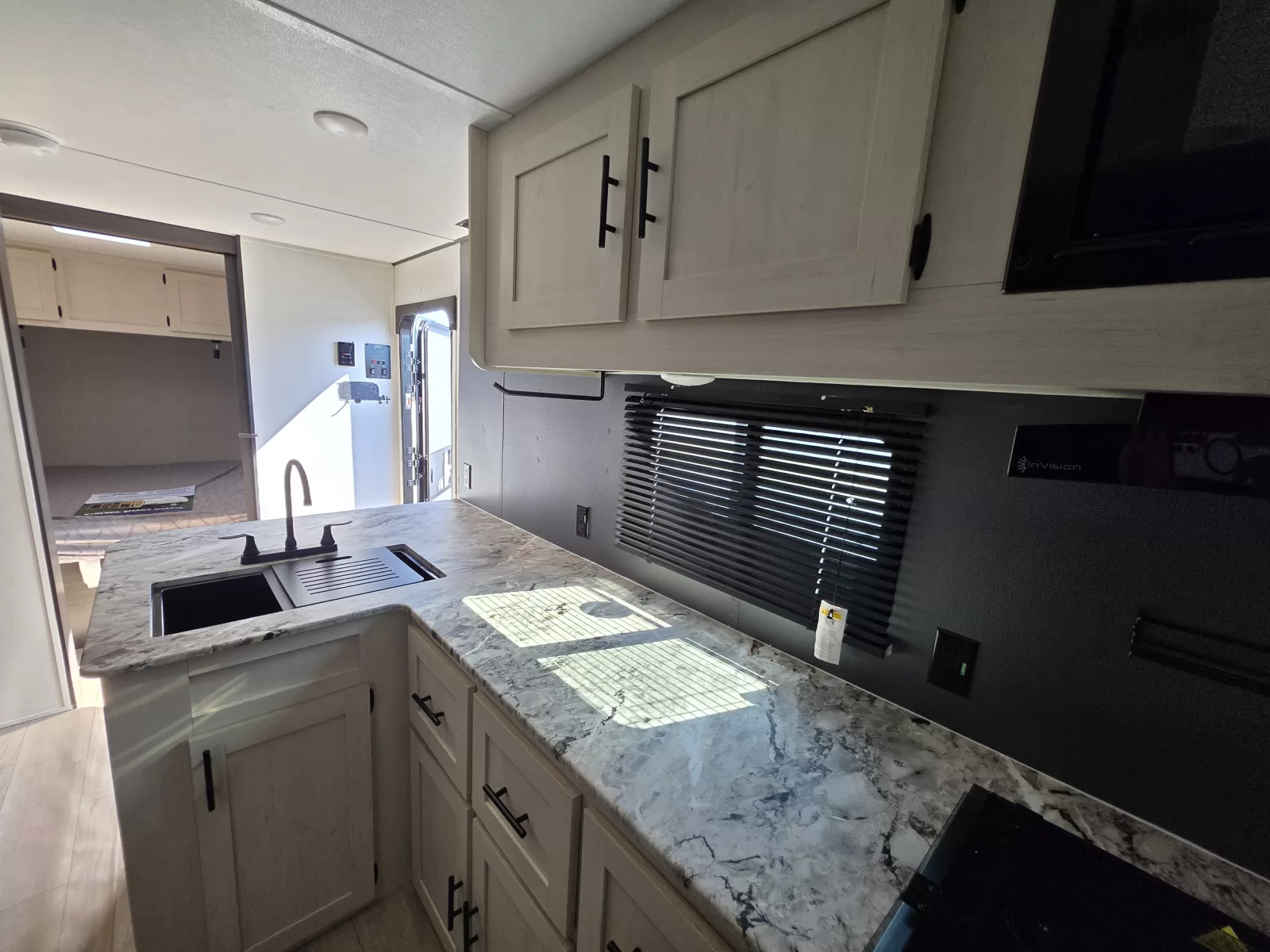 2027 Shasta Oasis 526RBS travel trailer exterior detail available at Bell Camper Sales in Bartlesville, Oklahoma