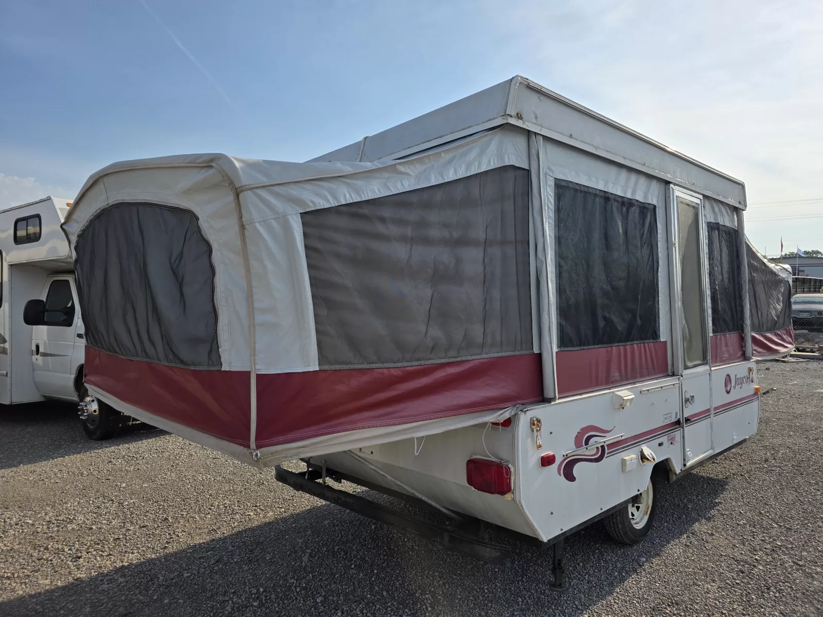 1995 Jayco Eagle 10 popup camper kitchen and dining area available at Bell Camper Sales in Bartlesville, Oklahoma